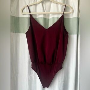 Silky burgundy bodysuit from Express